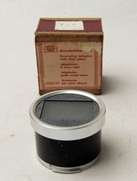 Focusing adapter with clear glass